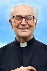 Hombre sonriendo con lentes

Descripci�n generada autom�ticamente